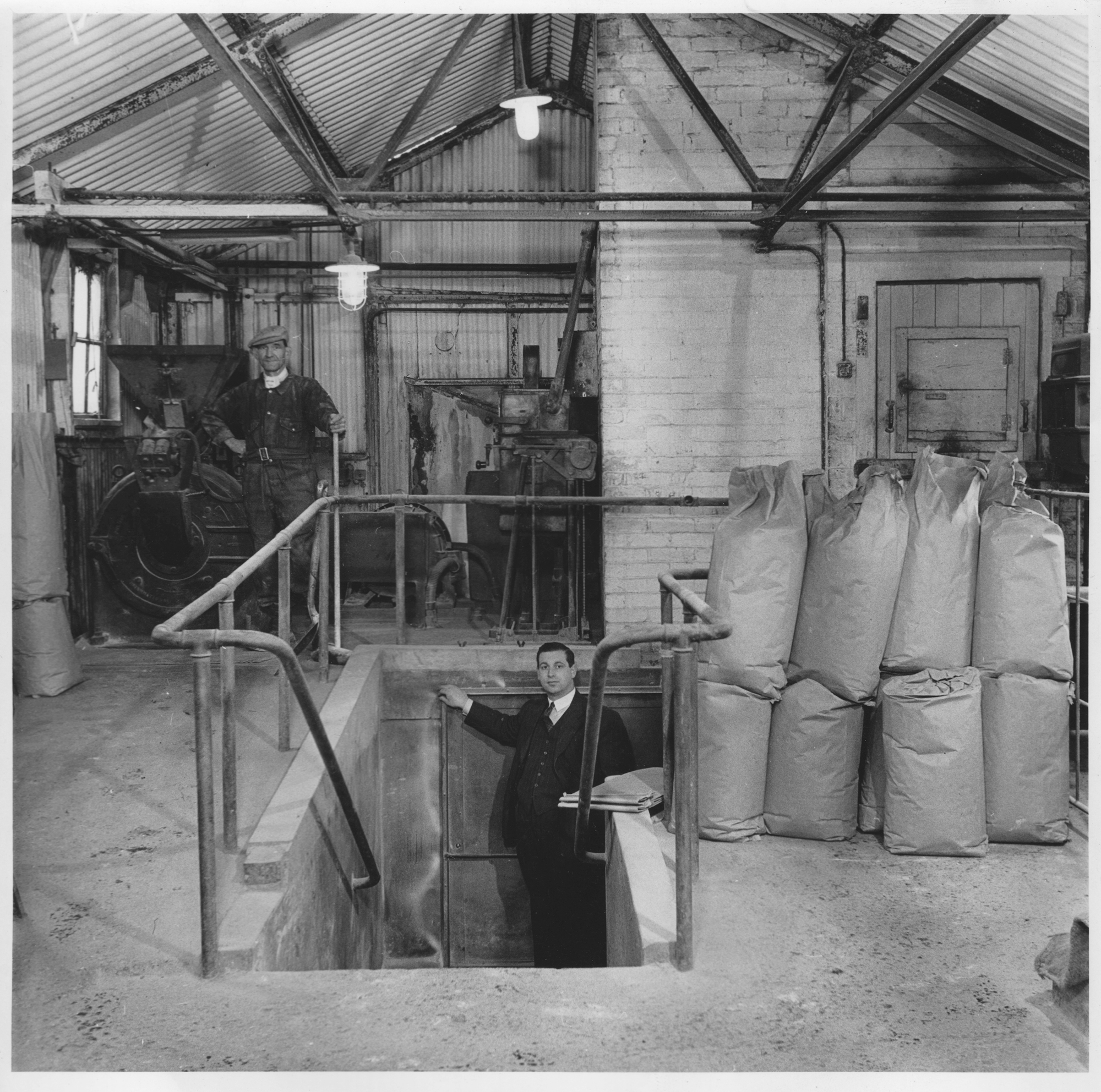 oldschool1 Pallman Mill with Felix Hamburger (uncle of the present owner) with finished gound powdered resins removed from the pit. Note the Health and Safety dust extractor chamber on the right.