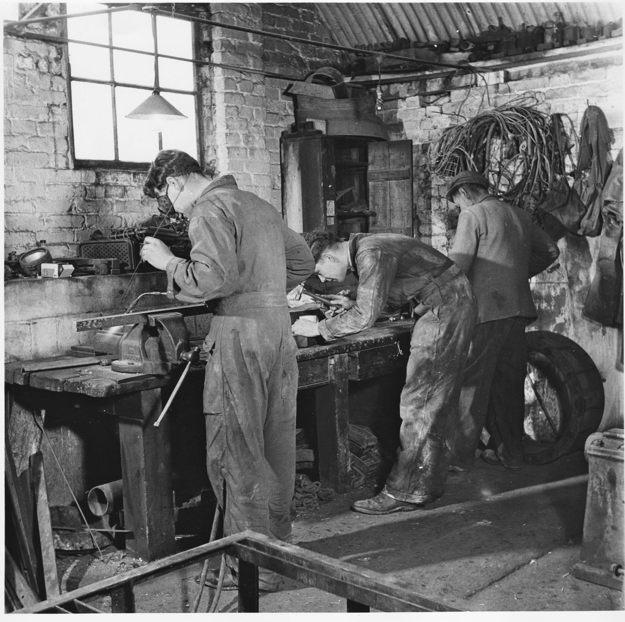 vices-and-work-bench Engineering Workshop in the1950s with H&S welding googles.