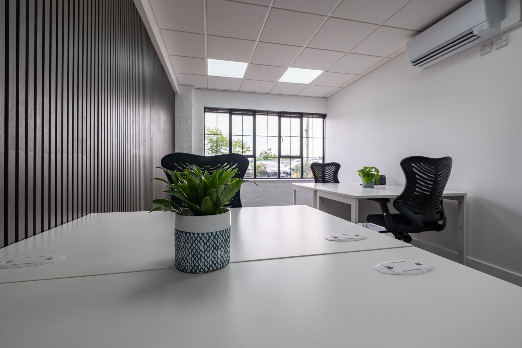 Office 3, Ground Floor, 4 Tannery House - 230FT² 4 Modern office with plants and desks
