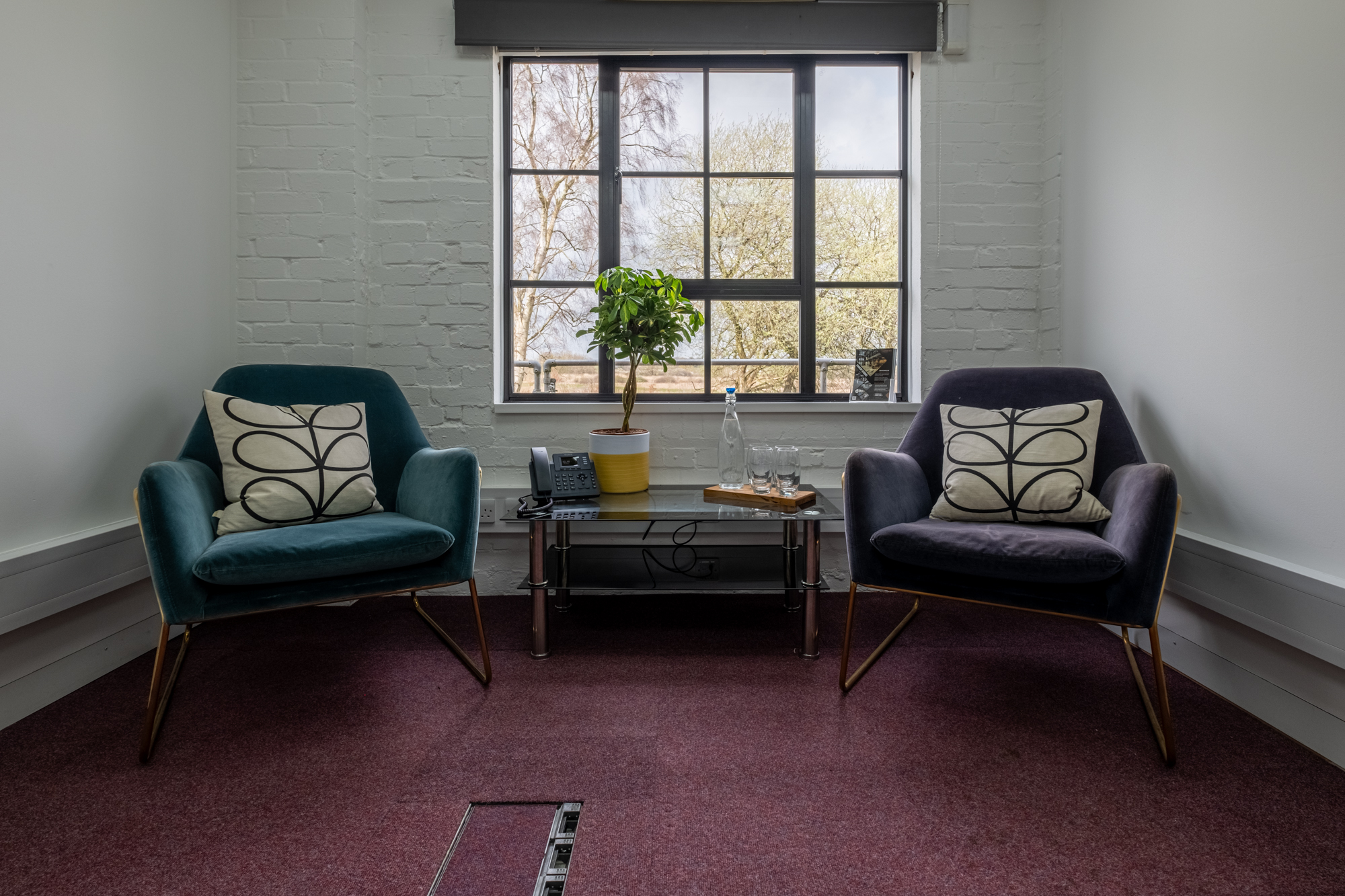 Office 7, Ground Floor, 4 Tannery House -218FT² 2 Two chairs facing a window.